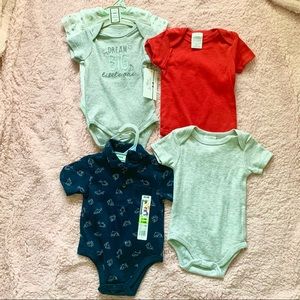 NEW 3-6 and 6-9 month onesies. Never worn
